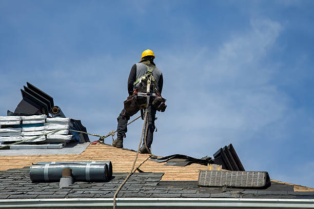 Professional Roofing technician working in Norton, OH